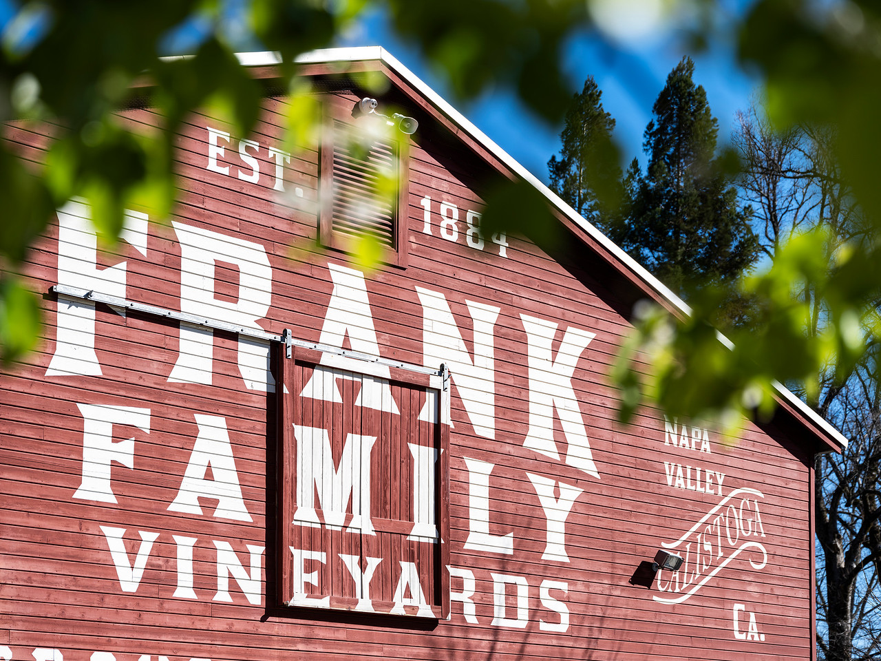 Frank Family Vineyards logo on barn side.