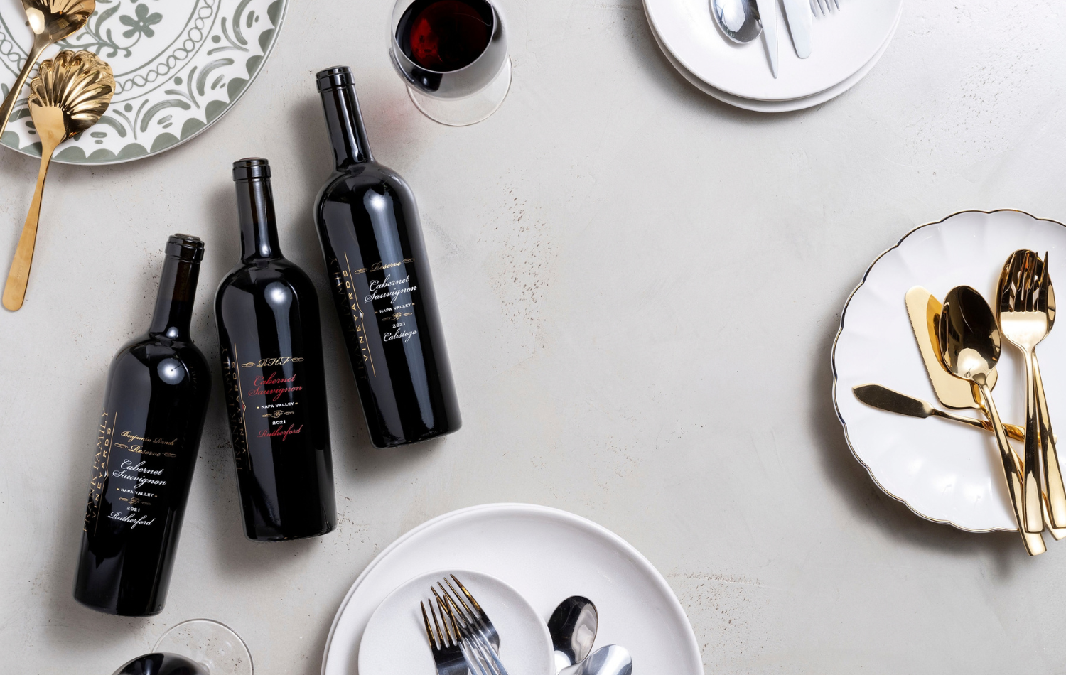 Frank Family Reserve wines against a serving platter backdrop. 