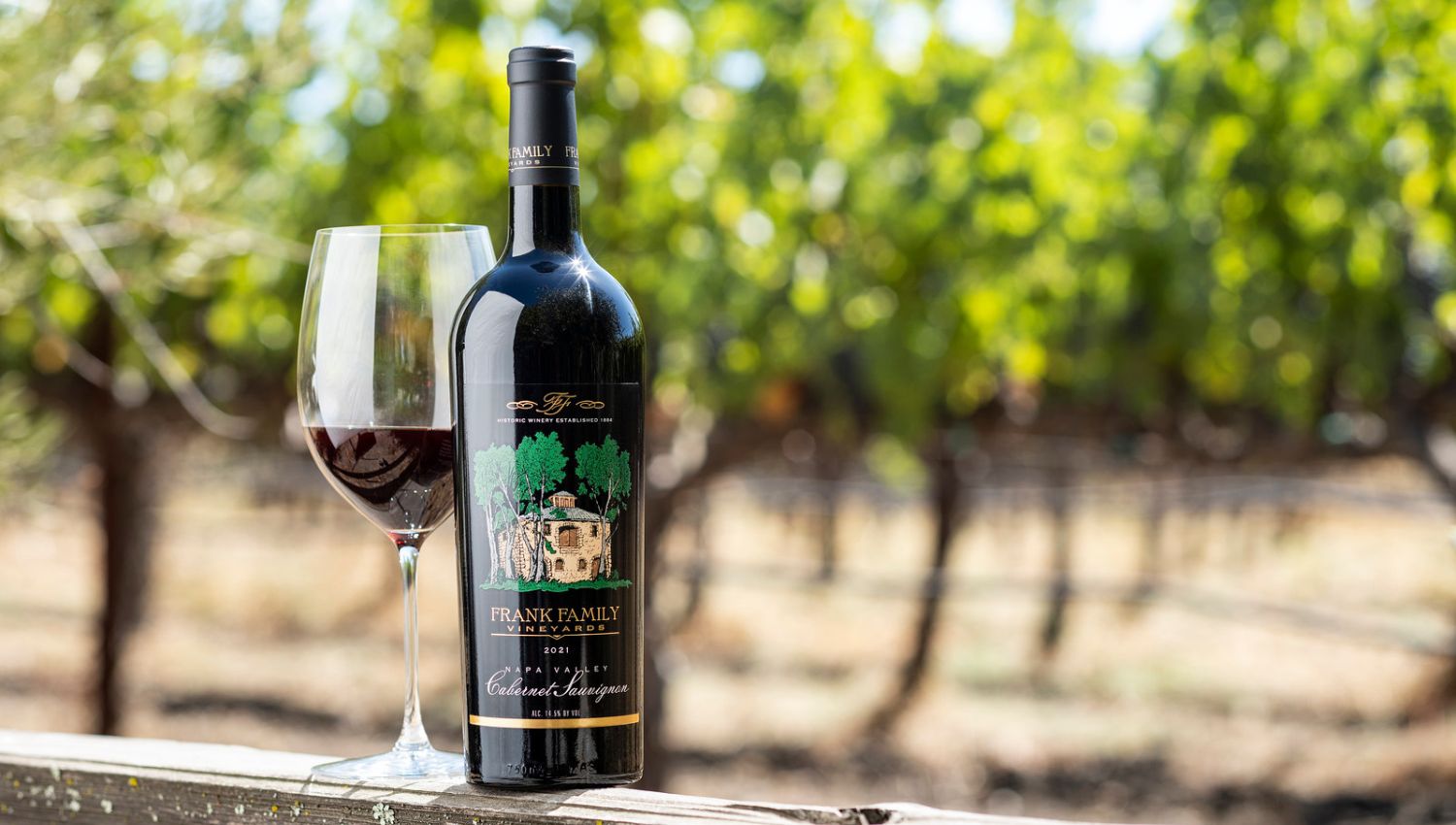 A bottle of Napa Valley Cabernet in the vineyard
