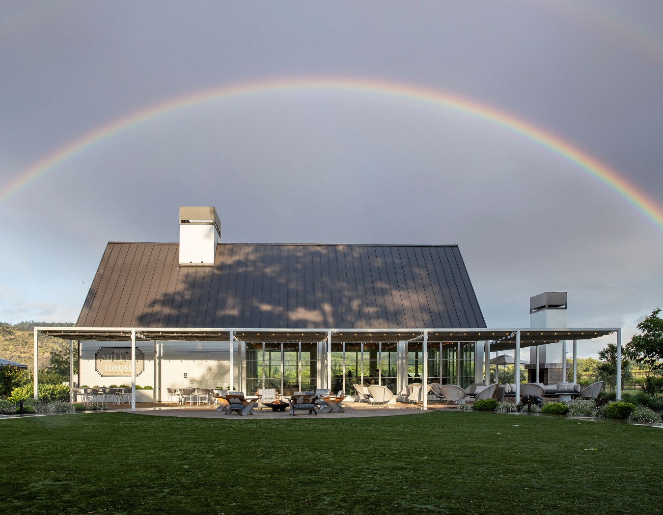 Miller House with a rainbow stretched over it. 